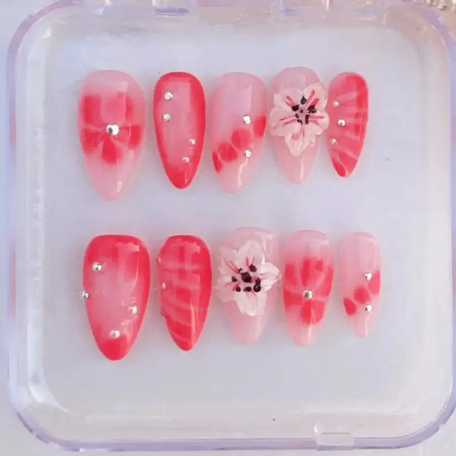 Faux ongles Kaymie rose corail fleur 3D élégant