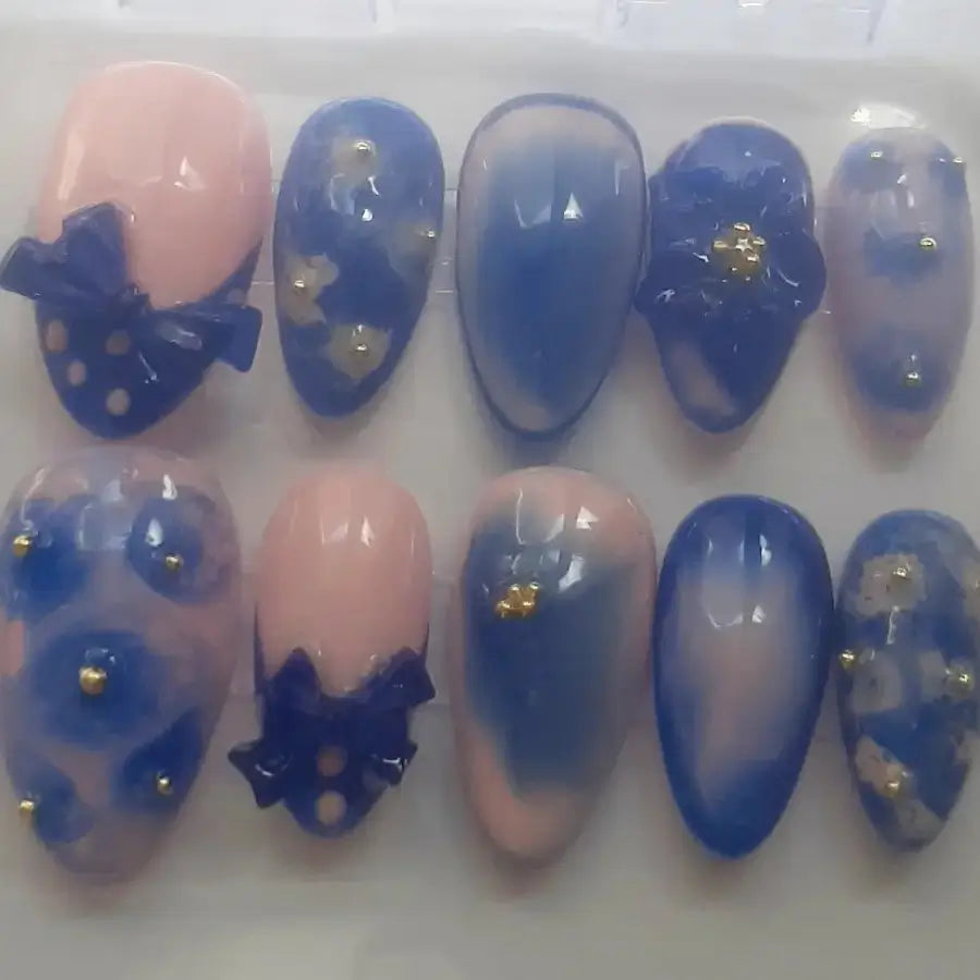 Press-on nails Ocean Bow bleu nœuds 3D détails dorés