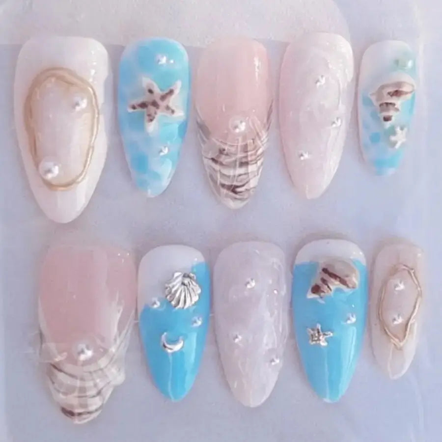 faux ongles aux couleurs de la plage méditerranéenne effet coquillage 3D et étoile de mer