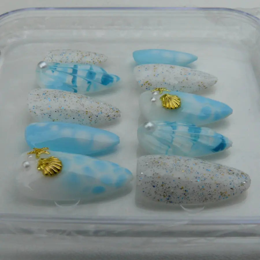 Press-on nails Nérina bleu mer étoiles coquillages