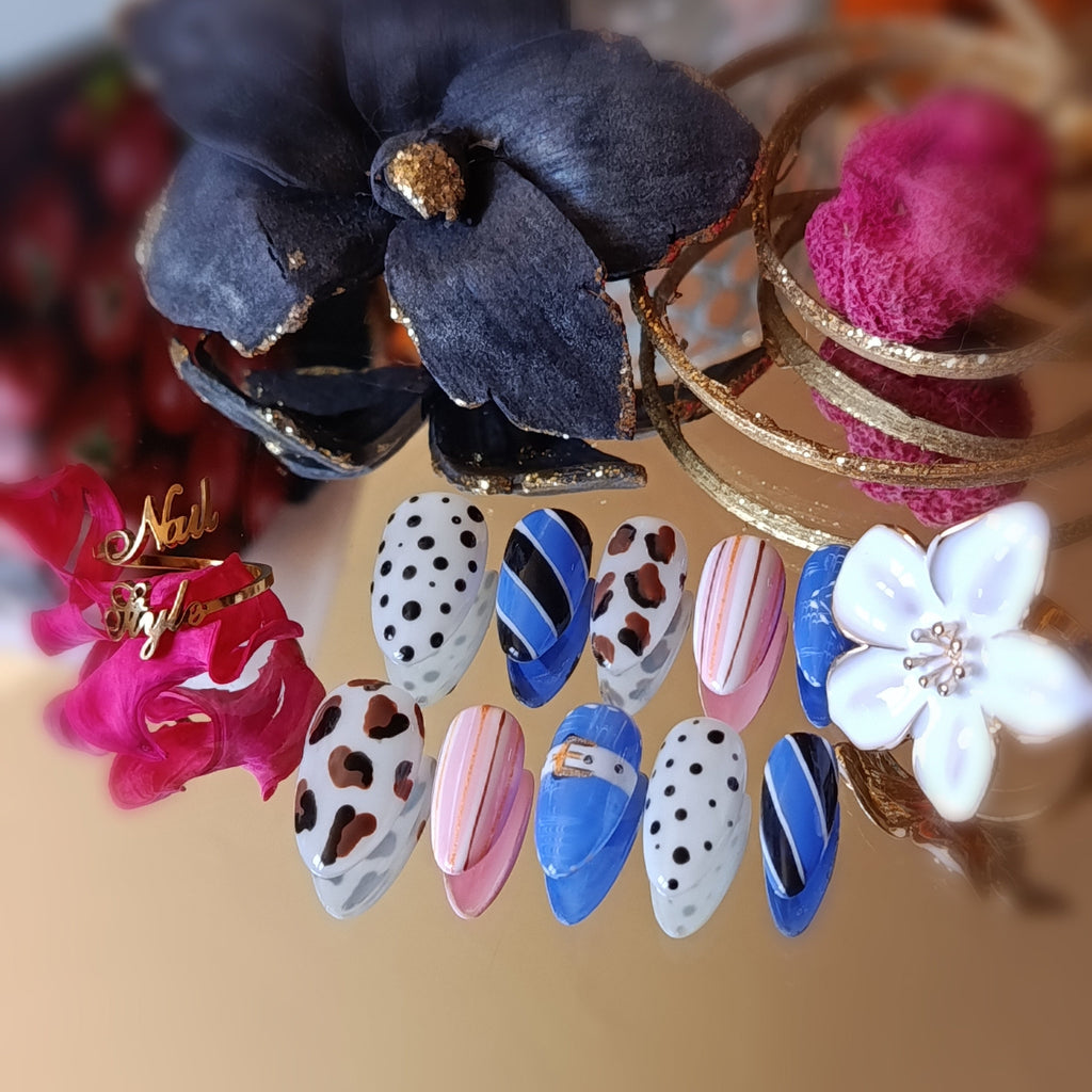 faux ongles réutilisables, press on nails amande médium, rayures, blanc à pois noirs