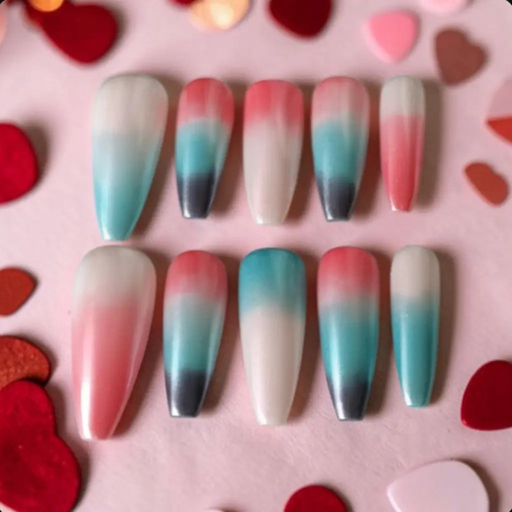 Faux ongles Sunset Lagoon effet nacré avec dégradé rose corail turquoise noir, finition brillante premium.